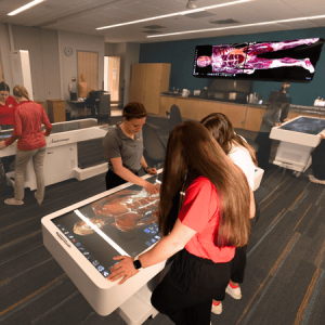 PT students using the anatomage table in the virtual anatomy lab 