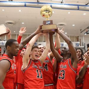 24-25 Mens Basketball Team with NEC trophy