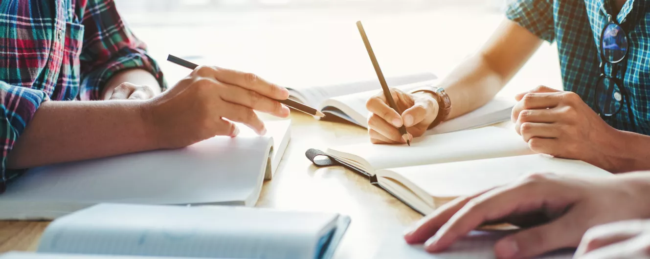 Students studying around table